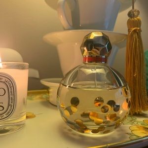 Kate Spade Twirl perfume. Open. Mostly full.